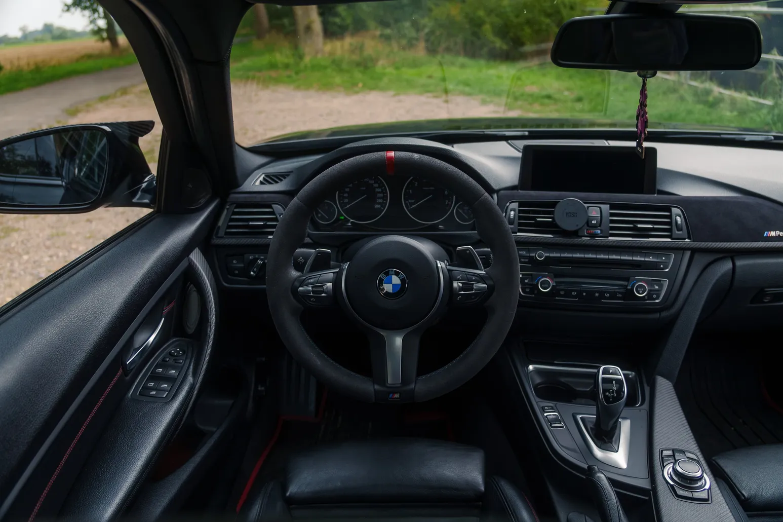 Driver view of the F30 interior and dashboard