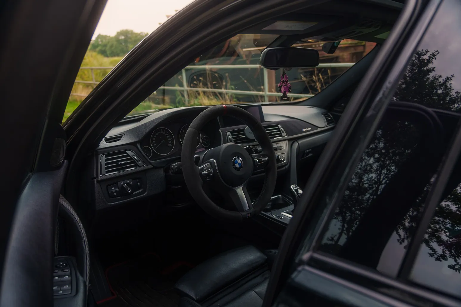 Interior seen through the open driver door