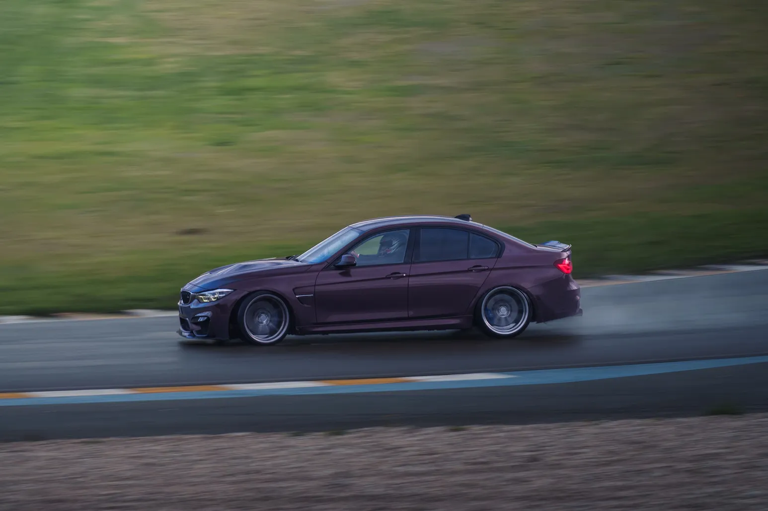 Purple BMW M3 (F80) panning shot