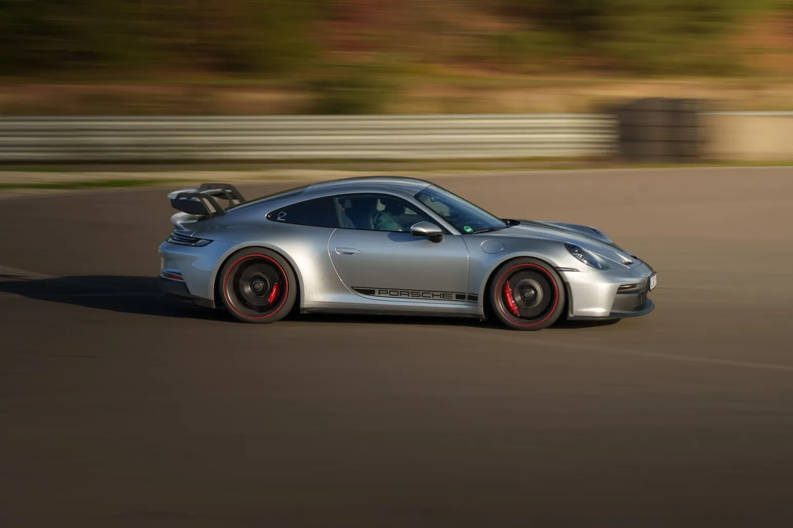 Silver Porsche 911 GT3 in side profile