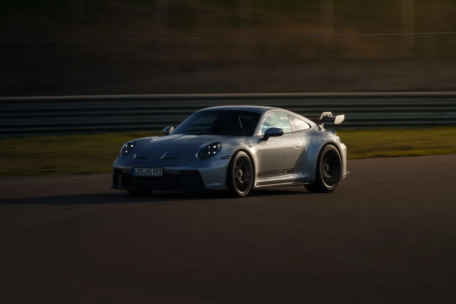 Silver Porsche 911 GT3 from the front three-quarter
