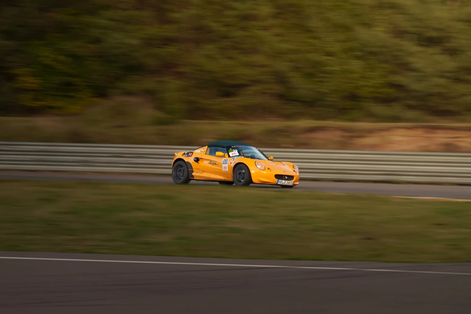 Orange Lotus Elise panning shot
