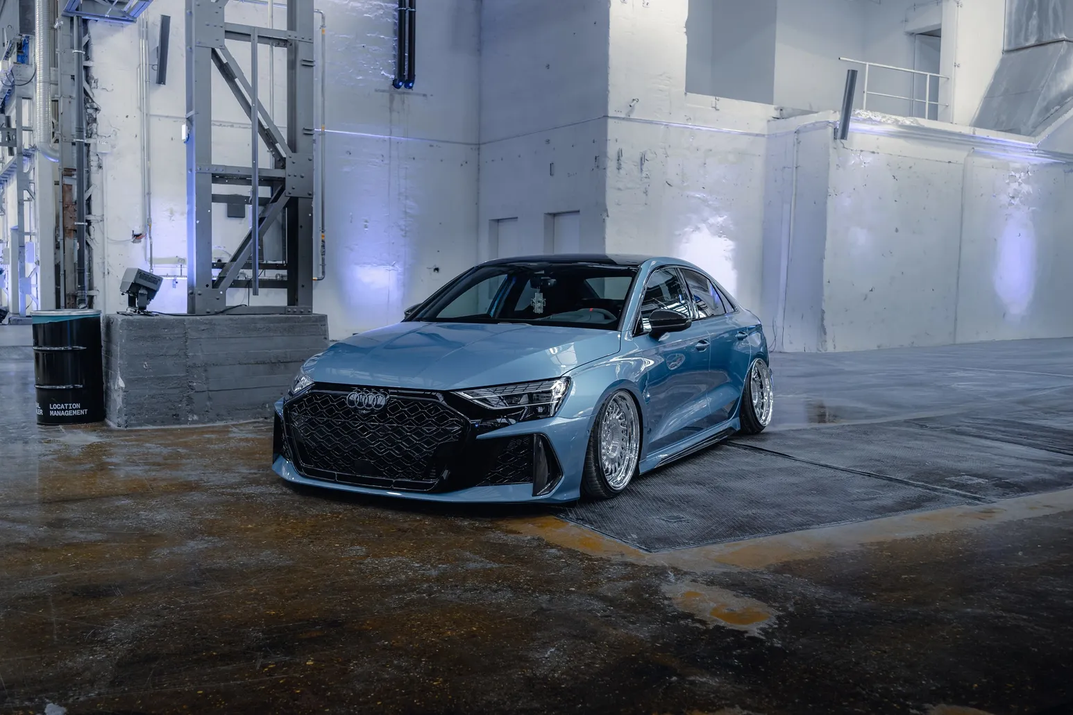 Light blue lowered Audi sedan in the hall