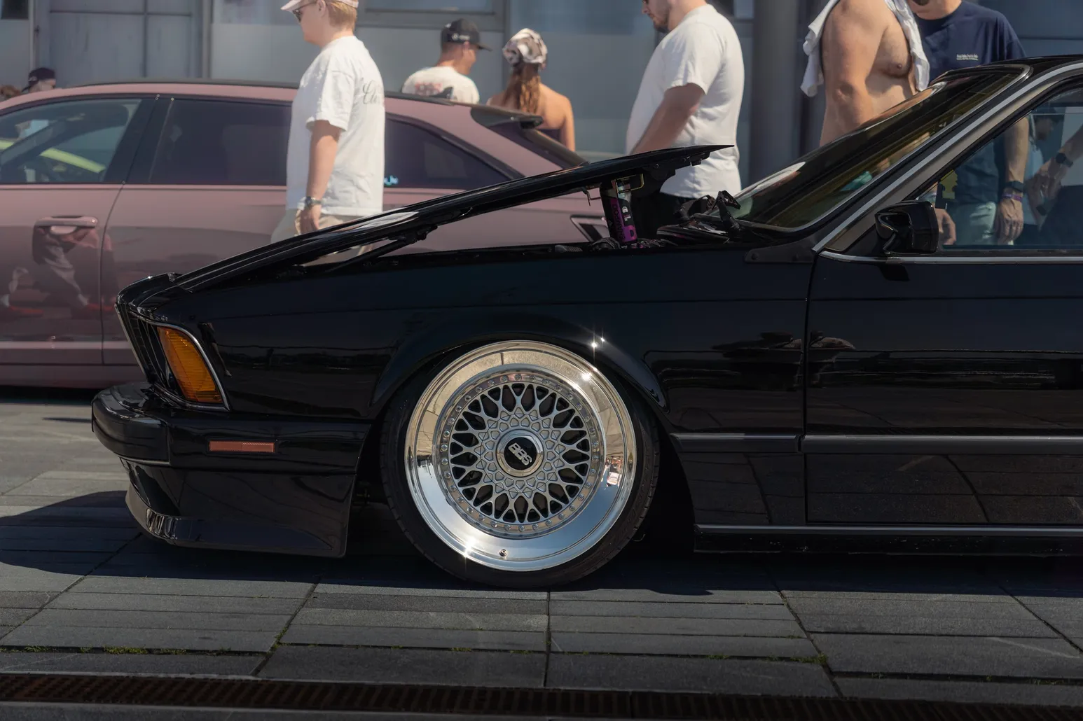 Black BMW E24 6 Series with BBS wheels in close-up